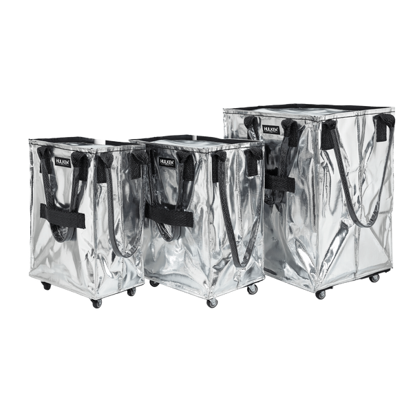 Three sizes of silver tote bags side by side for comparison